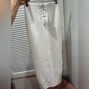 LONG STRETCH KNIT SKIRT WITH SLIT